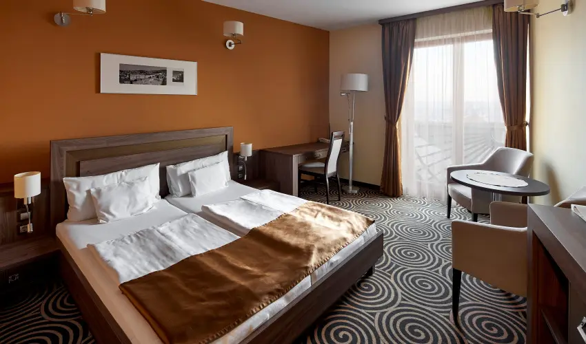 S�ndor Hotel P�cs - Kedvezm�nyes �r csal�dok r�sz�re reggelivel (1 �jt�l)